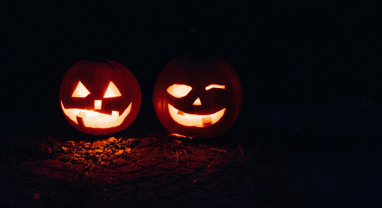Two glowing jack-o-lanterns