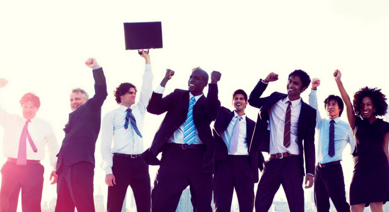 Group of business people happily posed