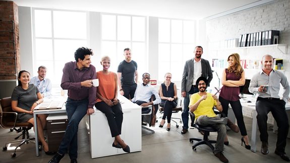 Happy employees in an office setting 