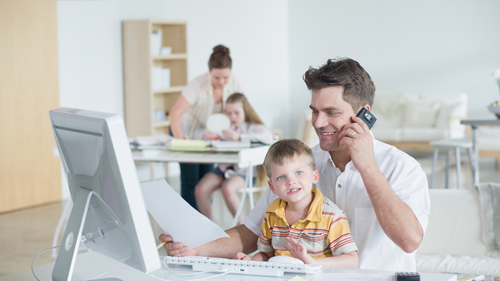 Man working from home with child